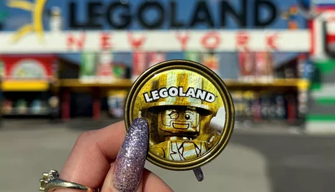 Mr. Gold Pop Badge in front of LEGOLAND New York