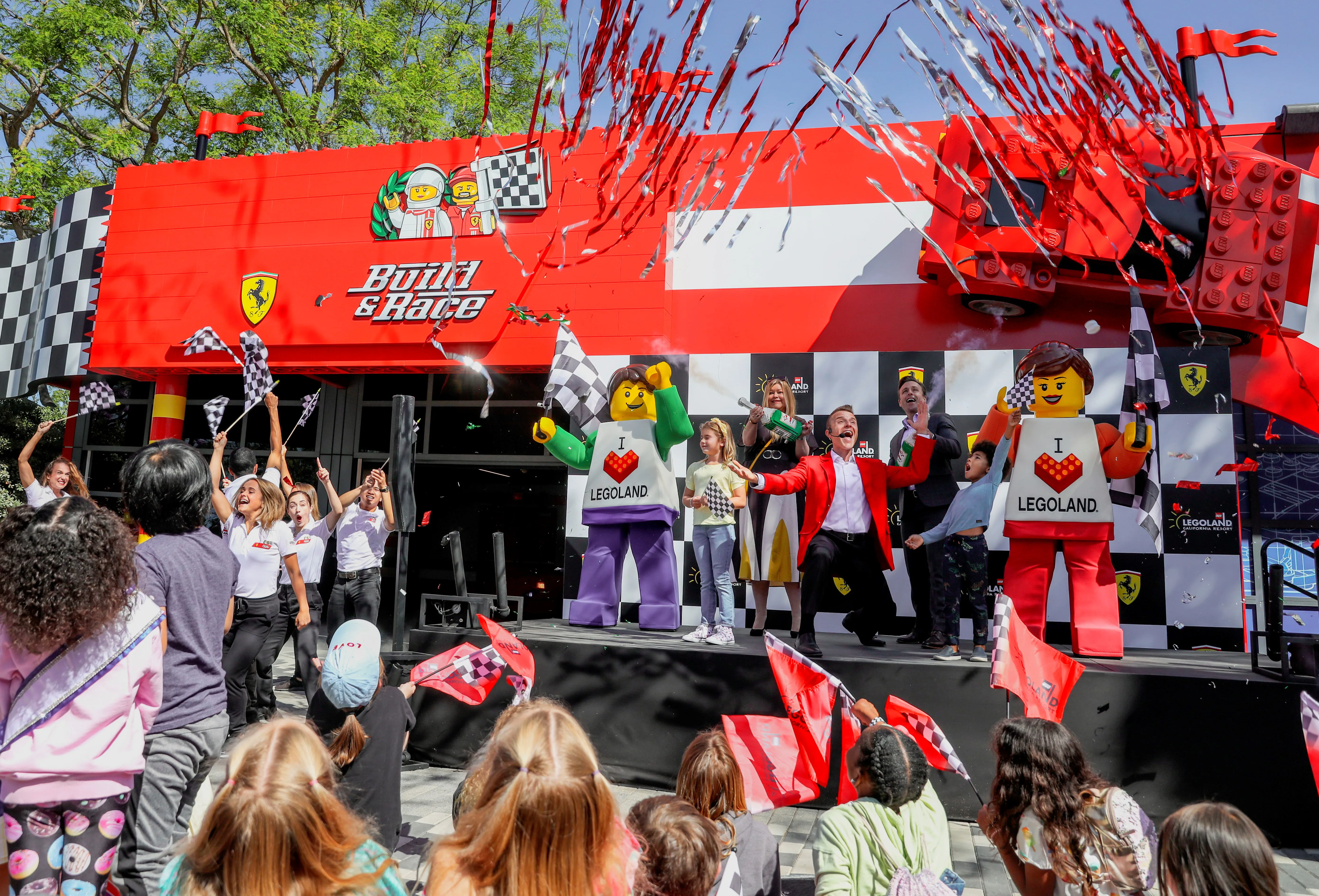 Confetti fills the air at the Ferrari Build and Race Opening Celebration at LEGOLAND California