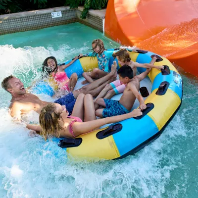 Family riding Orange Rush ride at LEGOLAND California Water Park