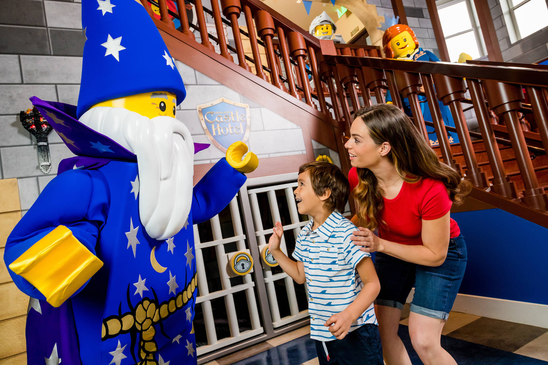 Mom and son meet Merlin the Wizard at the LEGOLAND Castle Hotel
