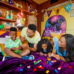 Family inside LEGOLAND® California Hotel Wizard Themed Room