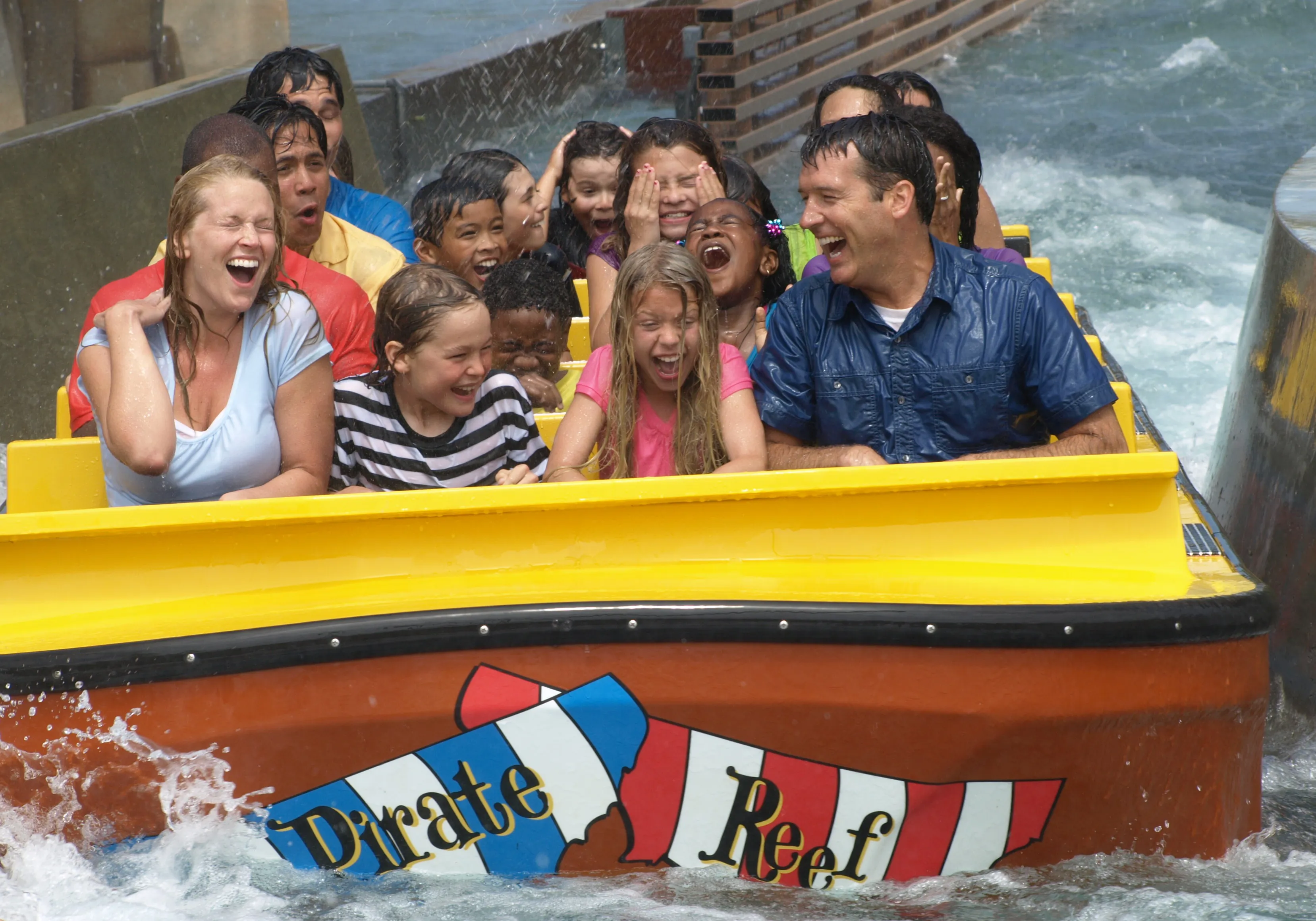 Family riding Pirate Reef ride at LEGOLAND California