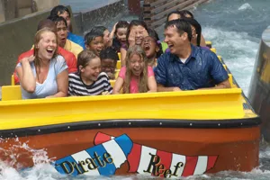 Family riding Pirate Reef ride at LEGOLAND California