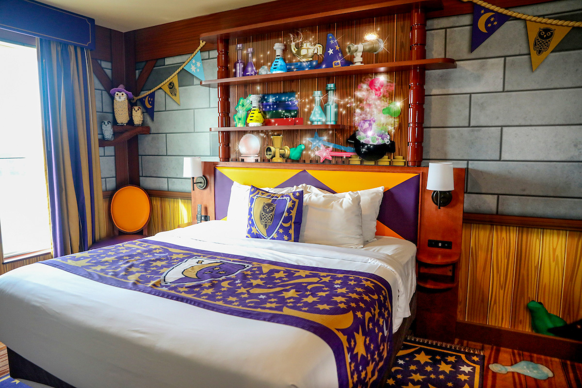 Adult bed in a wizard themed room