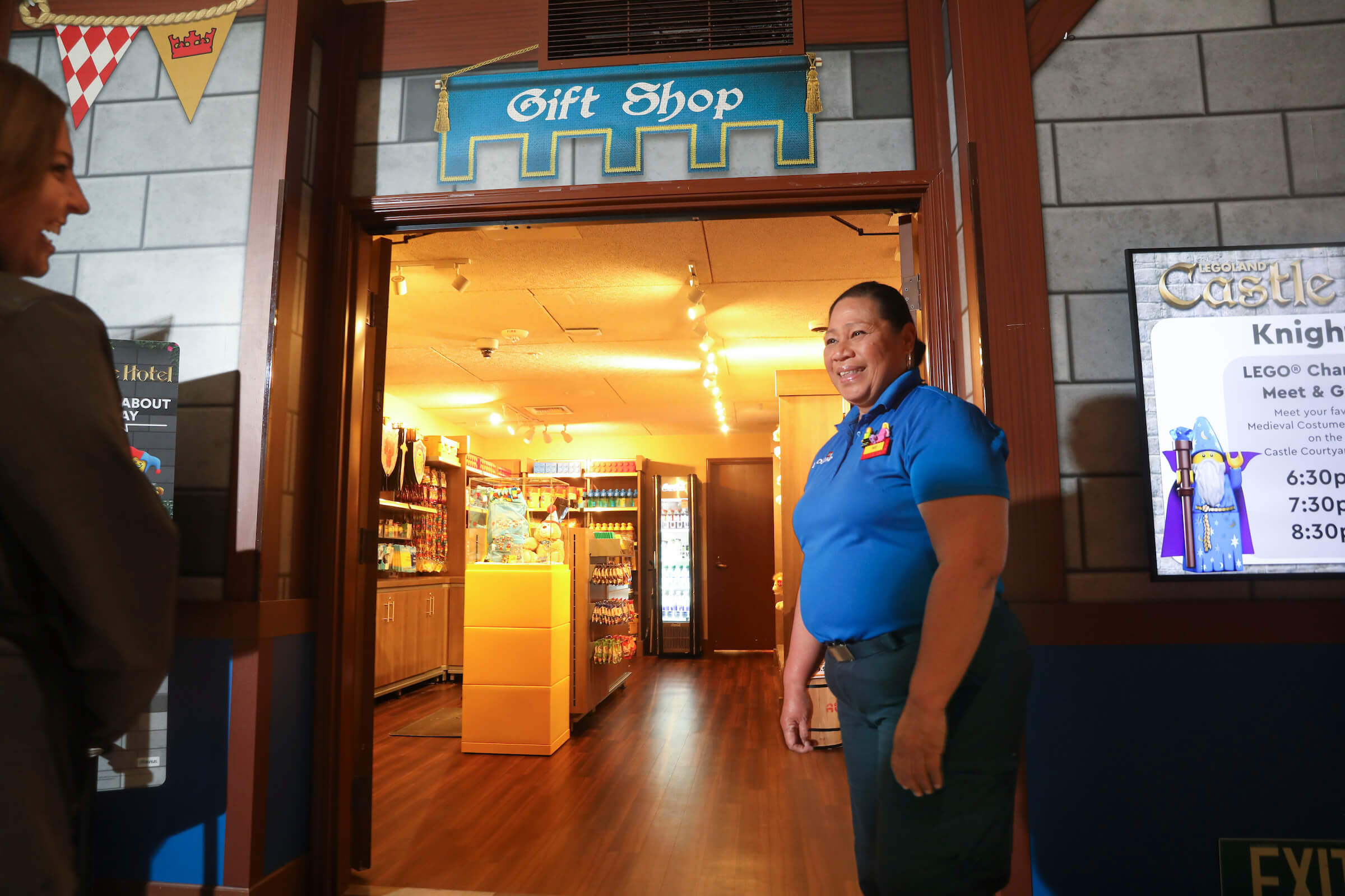 Model Citizen Greets Guests Outside the Castle Hotel Gift Shop