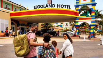 Family Walking Up to the LEGOLAND Hotel