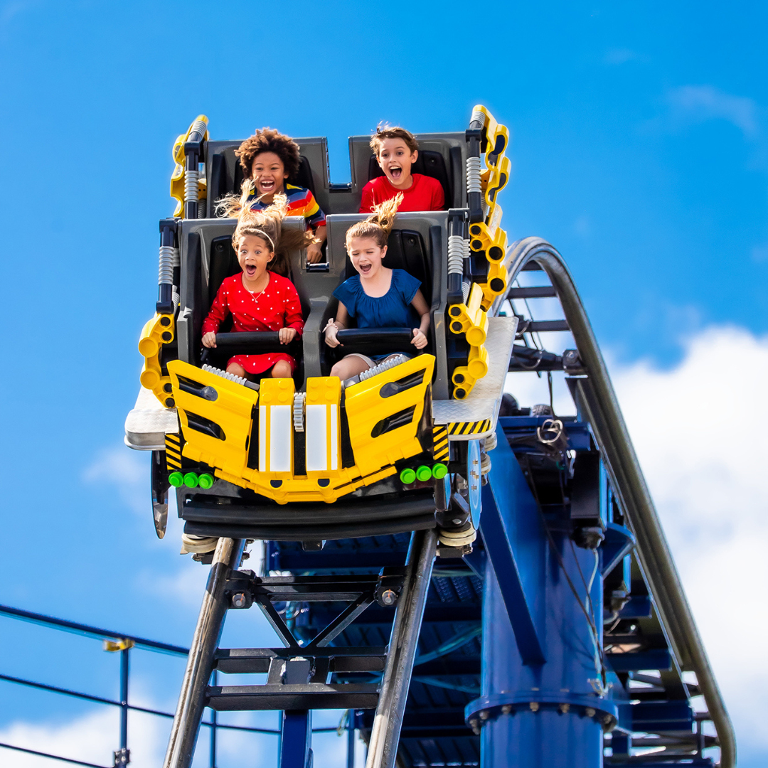 Kids riding on TECHNIC Coaster and screaming 