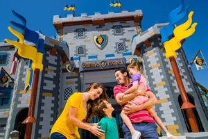 Family in front of LEGOLAND Castle Hotel