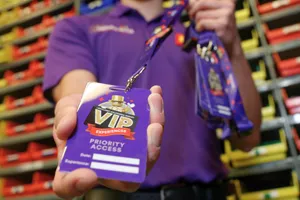 VIP Host holding VIP badge at Legoland California