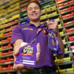 VIP Host holding VIP badge at Legoland California