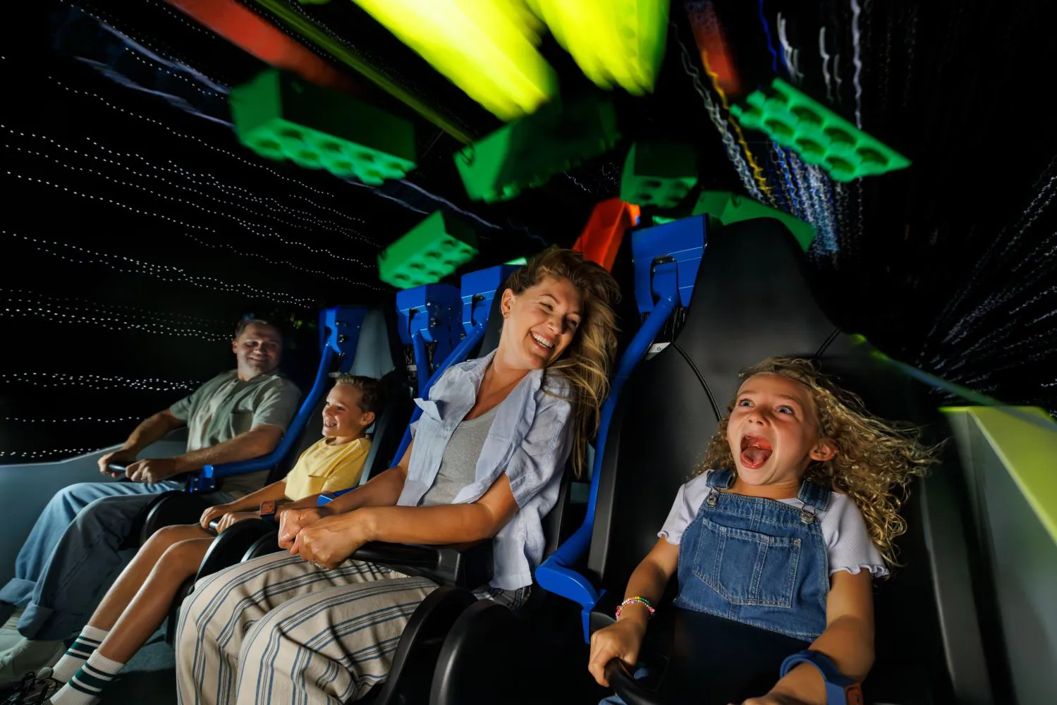 Family Riding Galacticoaster at LEGO Galaxy