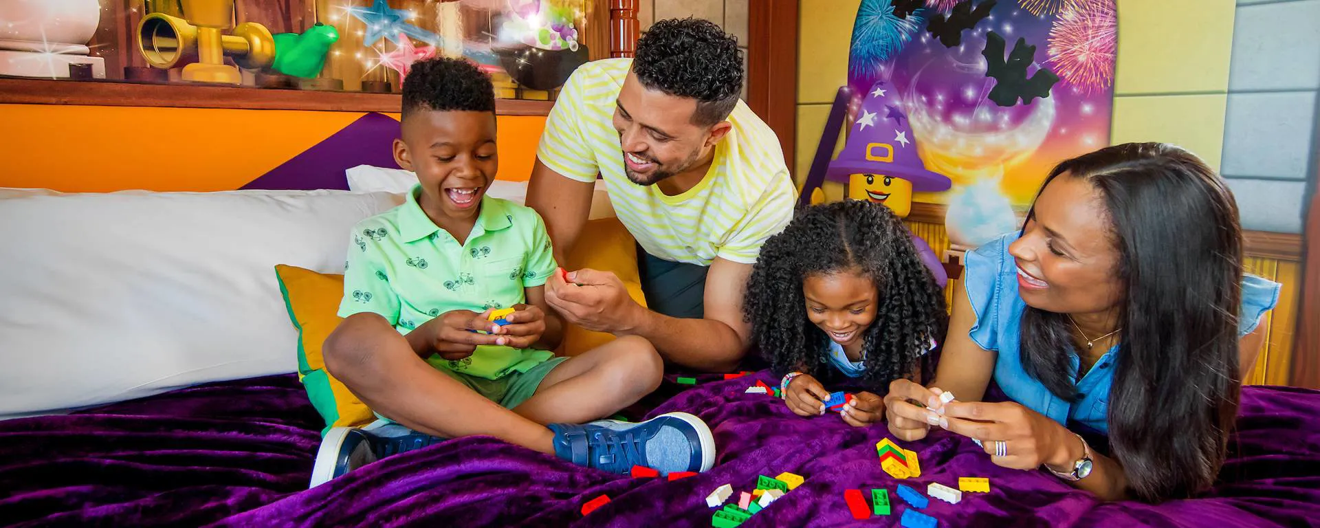 Family Builds with LEGO in a Wizard Room