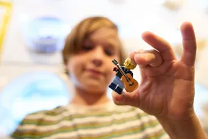 Boy With Minifigure