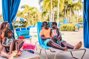 Family enjoying a water park cabana