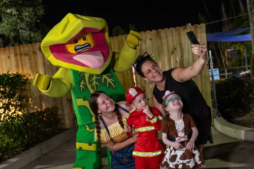 Plant Monster posing with family at LEGOLAND Florida Brick or Treat