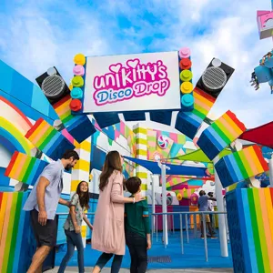 Family entering the queue for Unikitty’s Disco Drop ride at LEGOLAND Florida.