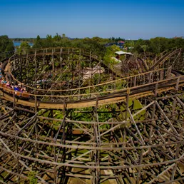 A family-friendly wooden coaster that curves and dips in and around a prehistoric jungle of life-sized LEGO® brick dinosaurs.