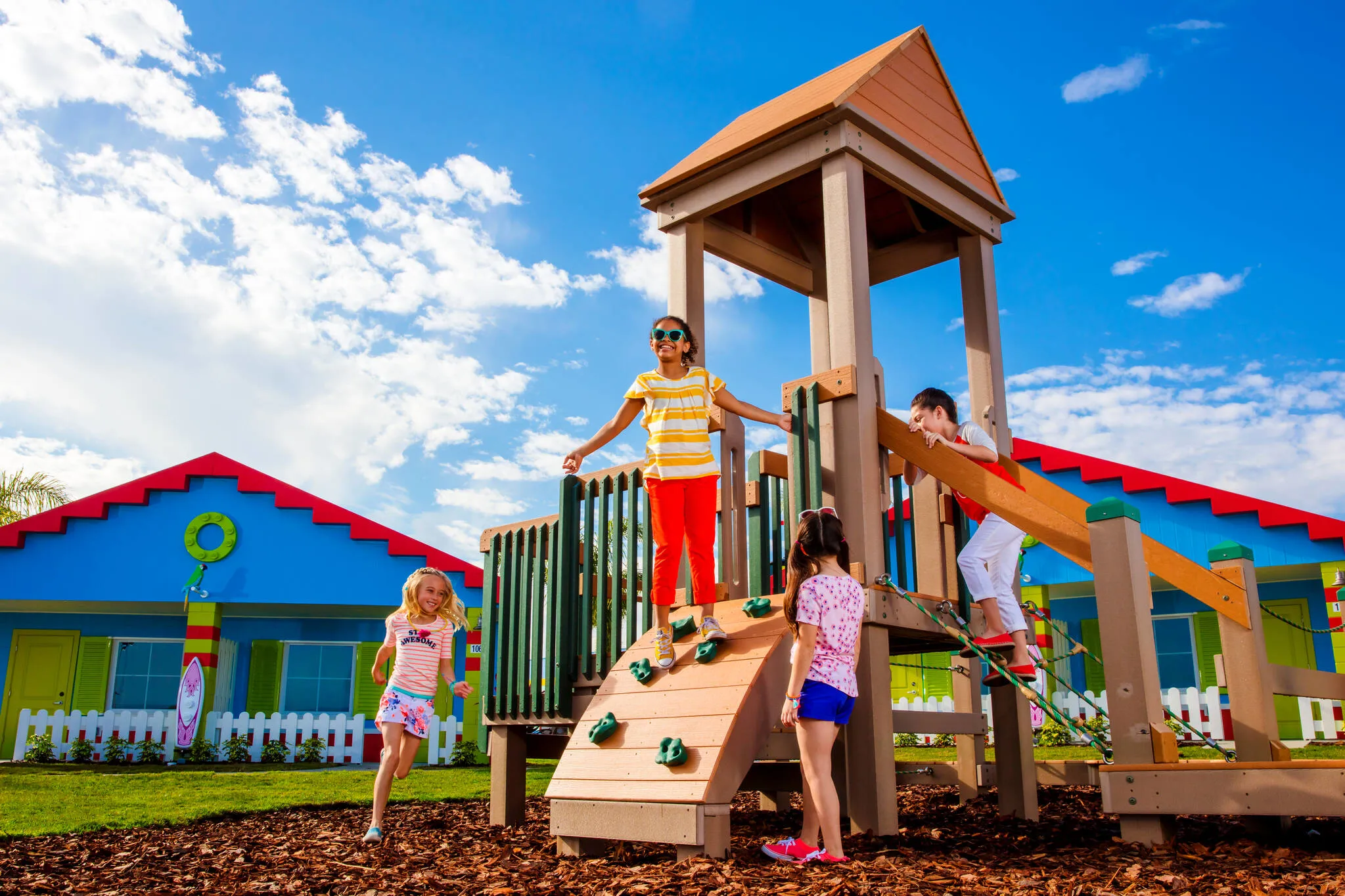 Kids Play at a Beach Retreat Outside Playground