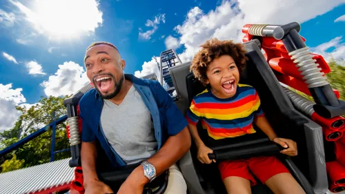 Dad and son on roller coaster