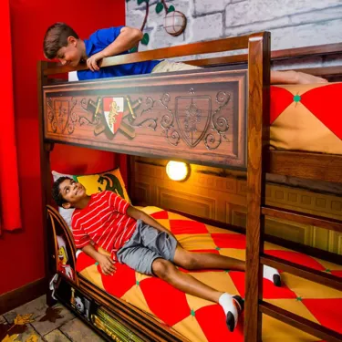 Each kids gets their own bunk bed in a Kingdom Themed Room