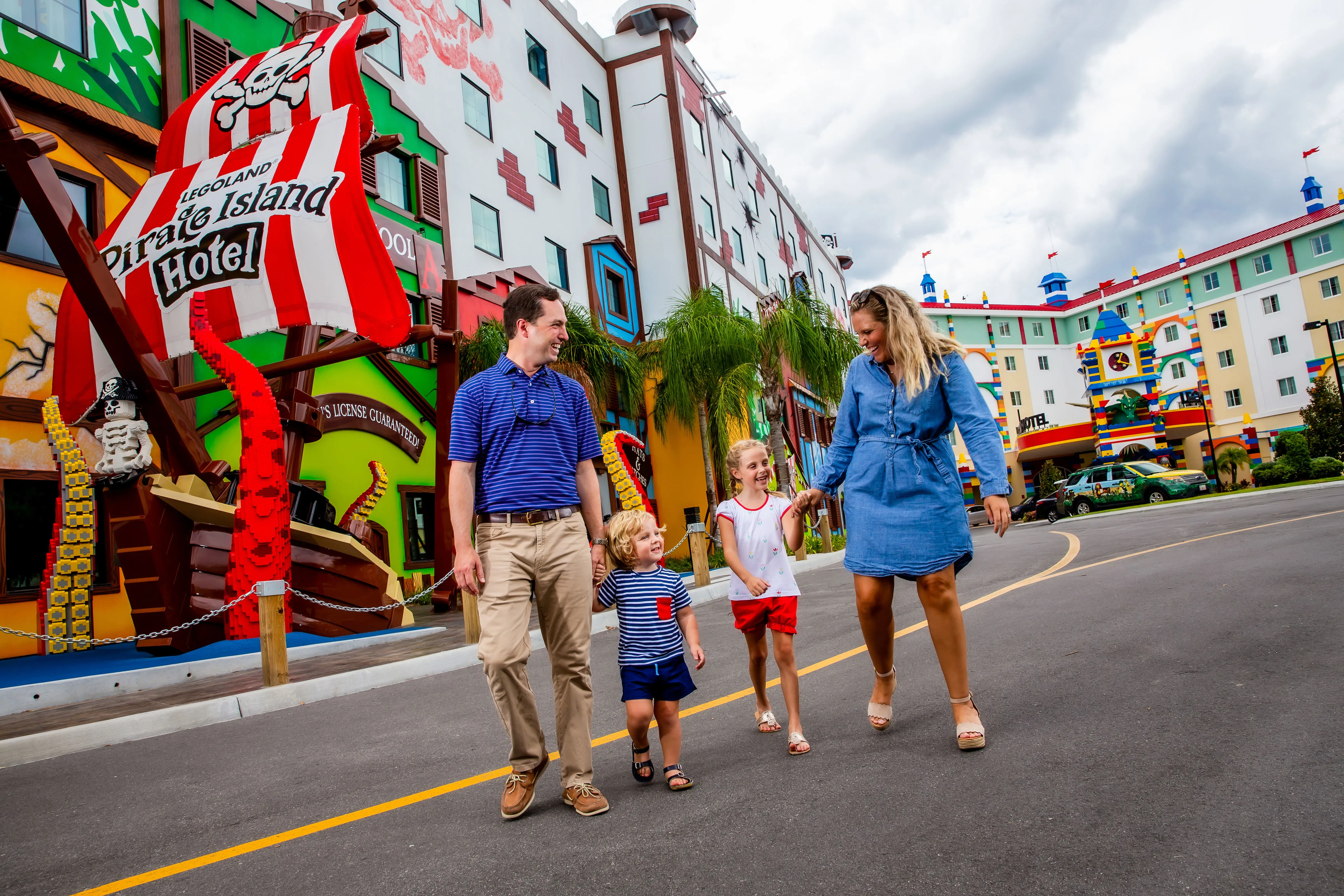 Family in front of Pirate Island Hotel