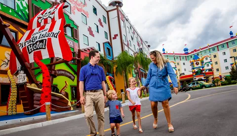 Family in front of Pirate Island Hotel