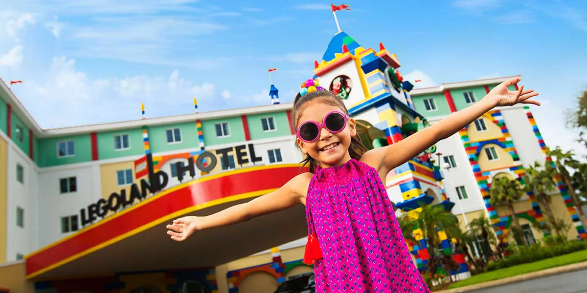 Girl posing in front of the hotel