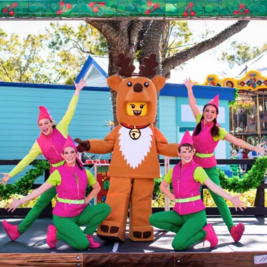 LEGO® Reindeer Girl and 4 elf performers on stage at LEGOLAND Florida Resort