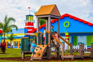 Kid's outdoor play area in every cove of Beach Retreat Resort