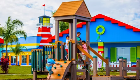 Kid's outdoor play area in every cove of Beach Retreat Resort