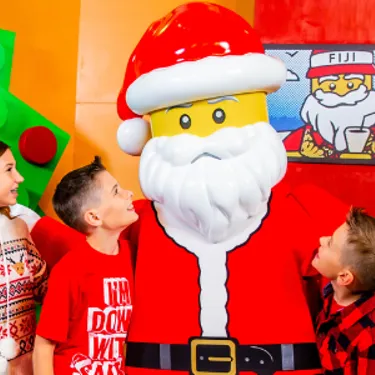 Children meeting Santa Claus during the holiday celebration at LEGOLAND Florida