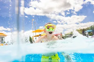 Boy with Goggles Swims in the LEGOLAND Hotel Pool