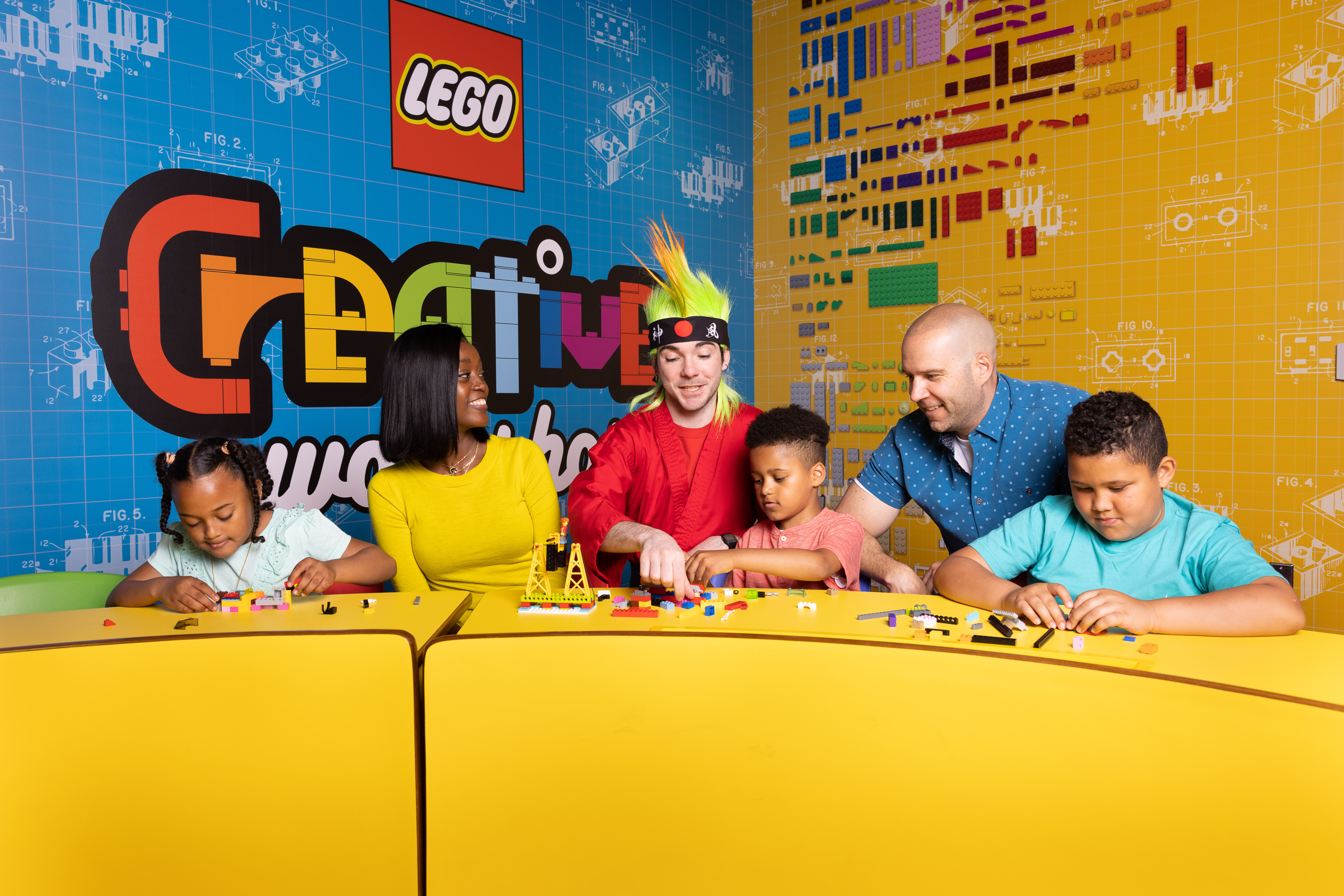 Families take a class with a Master Builder at the LEGO Creative Workshop