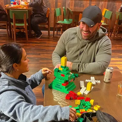 Adults Building With LEGO During Adult Night 7X5