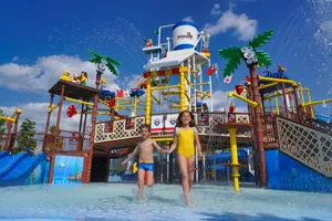 Cool down with splashes, sprays & slides at our Water Playground.