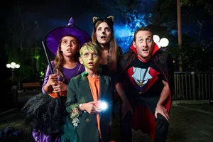 Family in costumes at Brick-or-Treat 