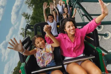 Mother and Daughter Riding the Dragon Coaster