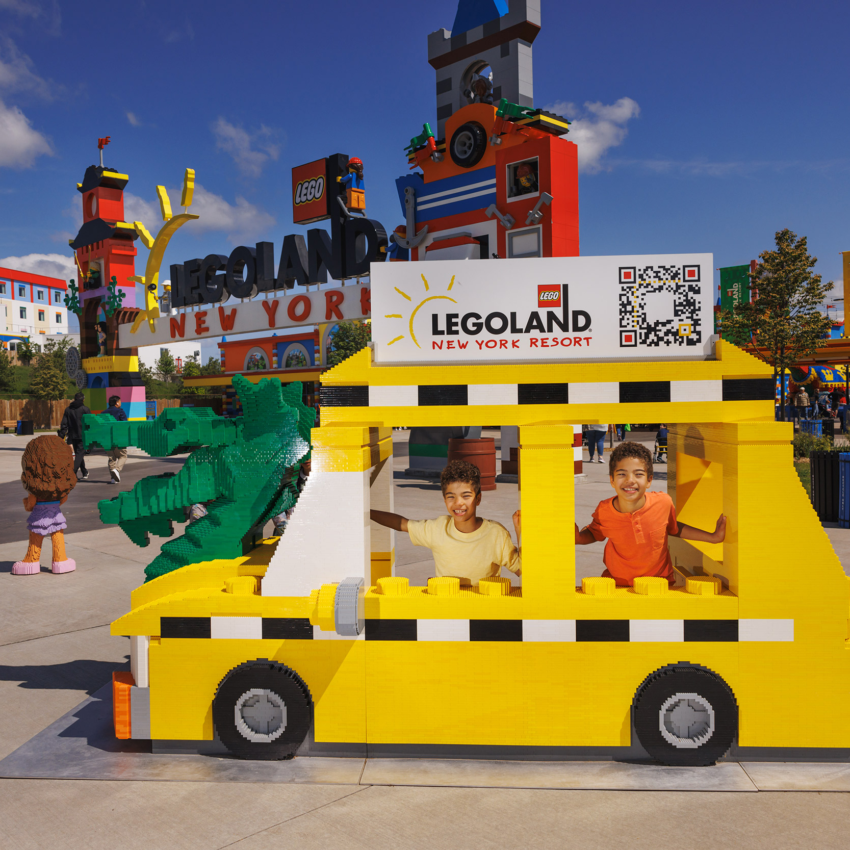 Boys Pose for a Photo in a Taxi made from LEGO