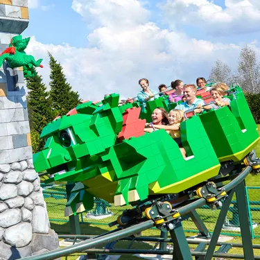 Family Smiling on Dragons Apprentice Ride