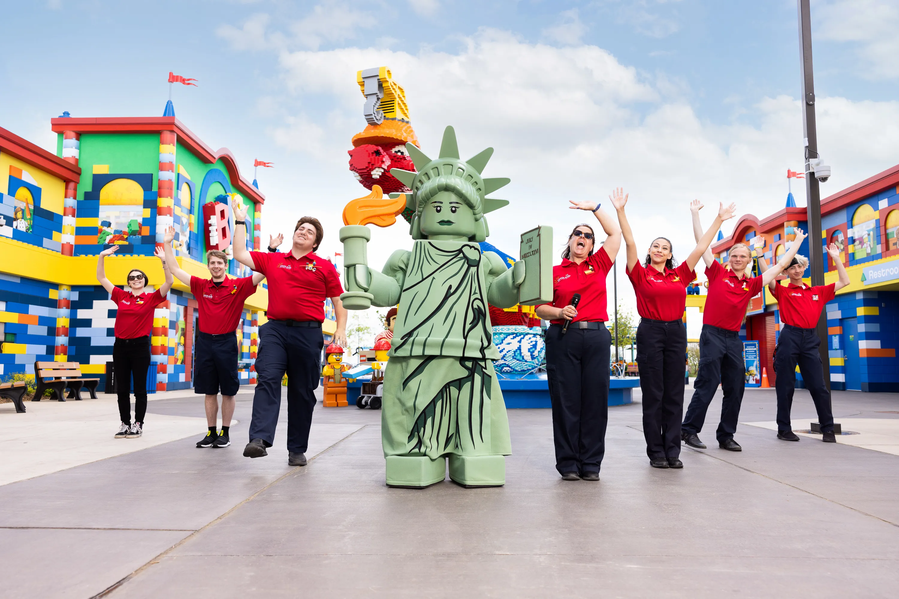 Lady Liberty poses with Model Citizens on Brick Street