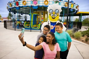 Family taking a selfie with Minifigure Character at LEGOLAND New York