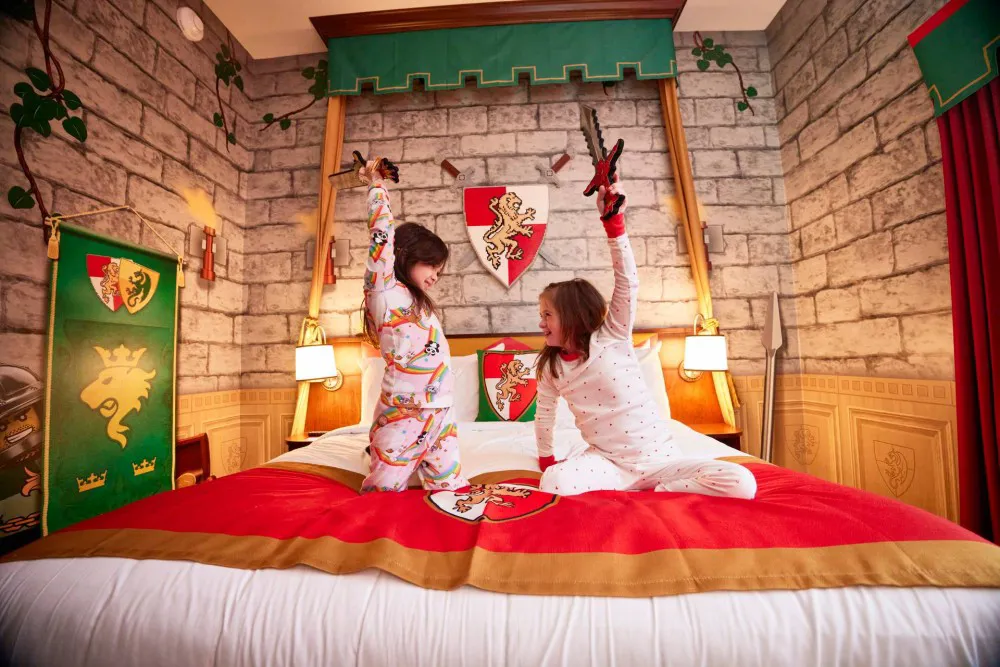 Girls Play with Foam Swords in a Kingdom Room