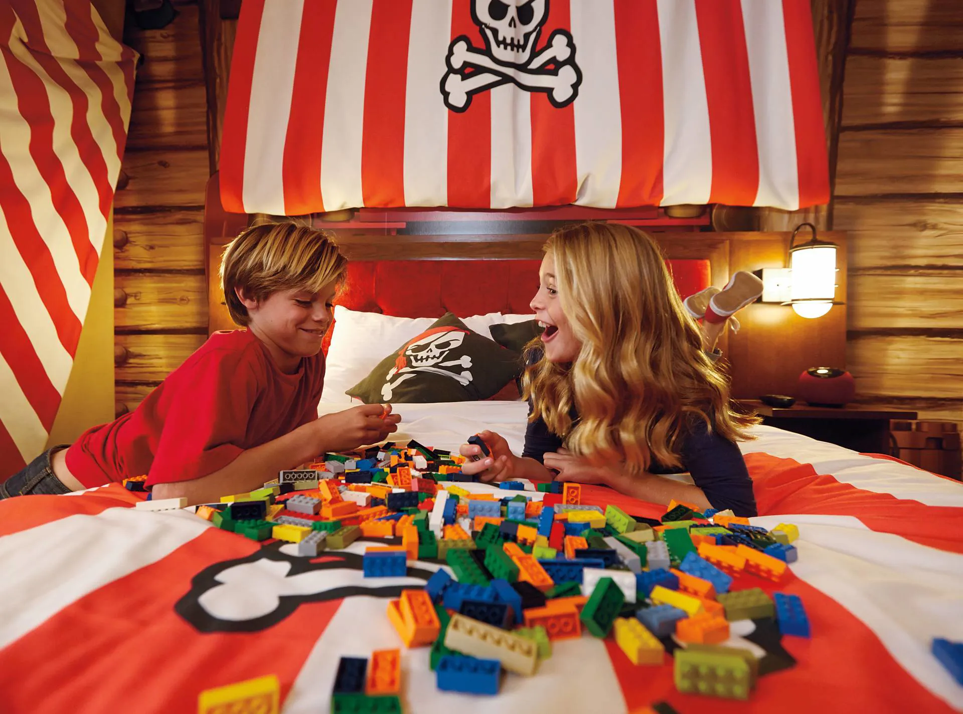 Kids Play With LEGO in a Pirate Themed Room