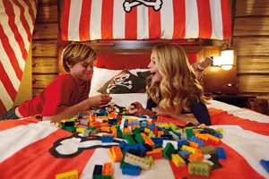 Kids Play With LEGO in a Pirate Themed Room