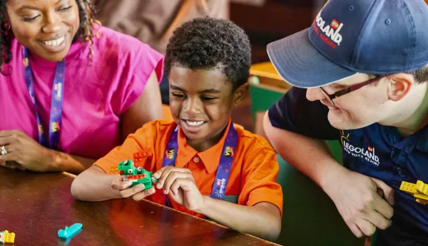 Boy building with LEGOs