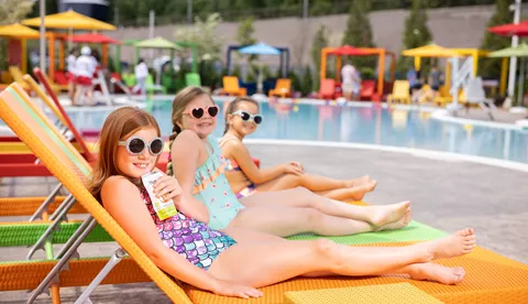 Girls Relax on Pool Chairs at the LEGOLAND Hotel Pool