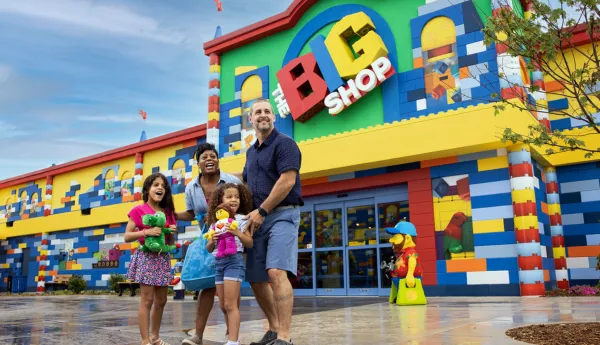 Family of four in front of The Big Shop