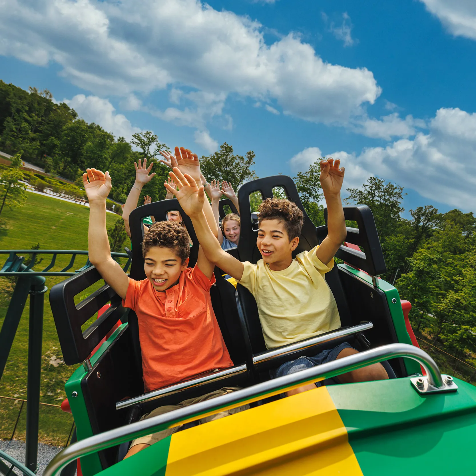 Kids Ride the Dragon Coaster