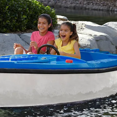 Girls riding a boat