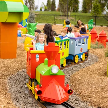 Kids hop aboard the Duplo number train for a fun ride with playful learning.